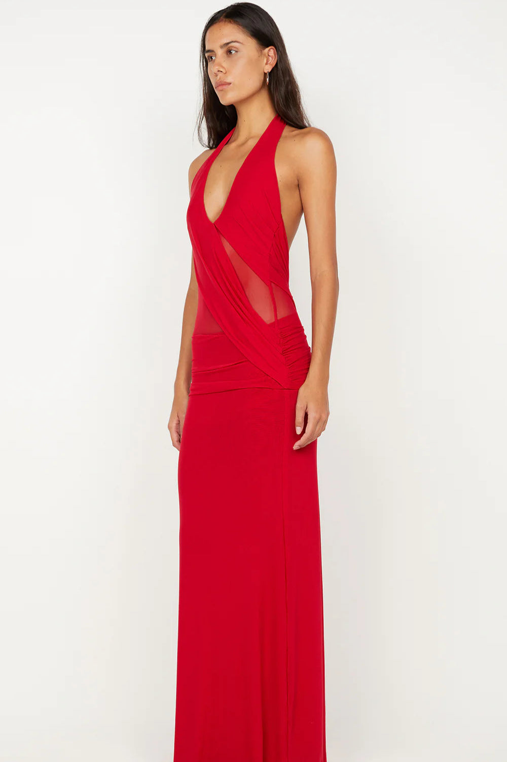 Red halter neck gown on a white background